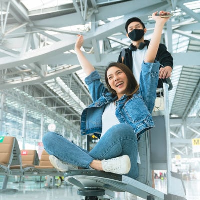 A woman excited to travel in Bangkok