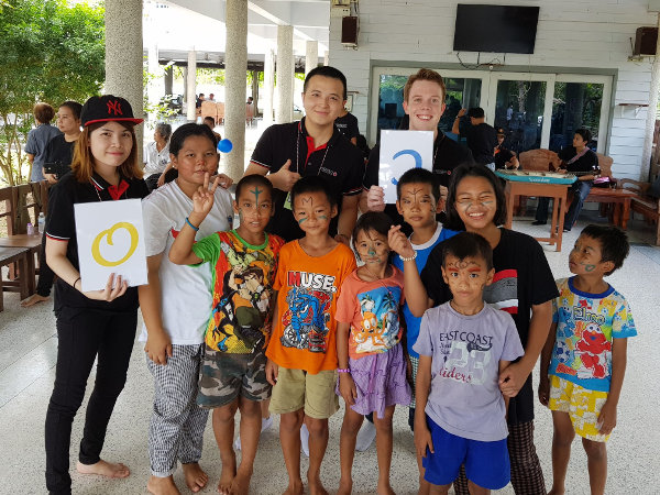 The Modulo team playing games with children at the orphanage